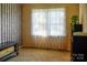 Neutral bedroom with large window at 7448 Forney Hill Rd, Denver, NC 28037