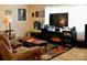 Cozy living room featuring a fireplace and comfortable seating at 7448 Forney Hill Rd, Denver, NC 28037