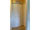 A pantry with bi-fold doors and a 