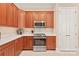 Modern kitchen features stainless steel appliances, lots of storage and bright countertops at 8115 Wilburn Ct, Charlotte, NC 28277