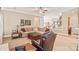 Open living room showing the staircase and featuring a comfortable seating arrangement at 8115 Wilburn Ct, Charlotte, NC 28277