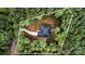 Aerial view of a home and its property lines nestled in a lush forest, offering privacy and natural beauty at 813 Montreat Dr, Dallas, NC 28034