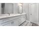 Bathroom featuring double sinks, modern lighting and quartz countertops at 813 Montreat Dr, Dallas, NC 28034