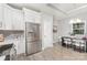 Updated kitchen with stainless steel appliances and a dining area at 813 Montreat Dr, Dallas, NC 28034