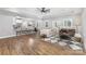 Open-concept living room flowing into the kitchen with bar seating at 813 Montreat Dr, Dallas, NC 28034