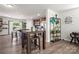 Open-concept living space with kitchen, dining, and living room all seamlessly connected for modern living at 8316 Waxhaw Hwy, Waxhaw, NC 28173