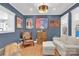 Cozy living room with hardwood floors and custom decor, creating a comfortable and stylish atmosphere at 832 Kemp Rd, Mooresville, NC 28117