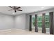 Spacious and airy bedroom with a large window and light gray paint at 8921 Whittingham Dr, Waxhaw, NC 28173