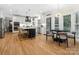 Open-concept kitchen and dining area with a large island, modern appliances, and lots of natural light at 8921 Whittingham Dr, Waxhaw, NC 28173