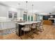 Spacious kitchen with a large island, stylish pendant lighting, and views to the living area at 8921 Whittingham Dr, Waxhaw, NC 28173