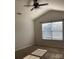 Spacious bedroom featuring a ceiling fan and a bright window offering ample natural light at 9170 Bradstreet Commons Way, Charlotte, NC 28215