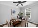 An inviting dining room with an elegant table setting, complemented by refined decor and natural light at 9227 Island Overlook Ct, Cornelius, NC 28031