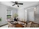 An inviting dining room with an elegant table setting, complemented by refined decor and natural light at 9227 Island Overlook Ct, Cornelius, NC 28031