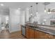 Open-concept kitchen with stainless steel appliances and granite countertops at 9227 Island Overlook Ct, Cornelius, NC 28031
