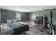 Basement features workout equipment and ample space for activities and storage at 9612 Old Dowd Rd, Charlotte, NC 28214