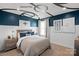 The bedroom features a custom ceiling, modern decor, and a large window at 102 Cartington Way # Haf0042, Mooresville, NC 28115