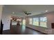 Bright, open floor plan showcasing a stylish kitchen and living area with large windows for ample natural light at 102 Cartington Way # Haf0042, Mooresville, NC 28115