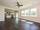 Open concept living area features large windows, connecting to a kitchen with modern appliances at 102 Cartington Way # Haf0042, Mooresville, NC 28115