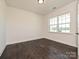 Bright room with large windows and hardwood floors at 102 Cartington Way # Haf0042, Mooresville, NC 28115