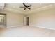 Large bedroom featuring a ceiling fan and adjacent access to the bathroom at 113 Tonbridge Way # Haf0031, Mooresville, NC 28115
