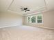Spacious bedroom featuring a ceiling fan and large windows for ample natural light at 113 Tonbridge Way # Haf0031, Mooresville, NC 28115