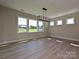 Open and airy dining area with abundant natural light at 113 Tonbridge Way # Haf0031, Mooresville, NC 28115