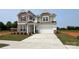 Beautiful two-story home with neutral color scheme and well-manicured lawn at 113 Tonbridge Way # Haf0031, Mooresville, NC 28115