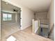 Open hallway with wood floors overlooking a bedroom and staircase at 113 Tonbridge Way # Haf0031, Mooresville, NC 28115