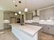 Well-equipped kitchen featuring a large island, stainless steel appliances, and ample cabinetry at 113 Tonbridge Way # Haf0031, Mooresville, NC 28115