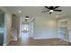 Bright living room featuring hardwood floors, recessed lighting, and built in bookshelves at 113 Tonbridge Way # Haf0031, Mooresville, NC 28115