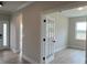 Office space with French doors, hardwood flooring, and natural light at 113 Tonbridge Way # Haf0031, Mooresville, NC 28115