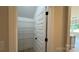Walk-in pantry with wire shelving for organized storage at 113 Tonbridge Way # Haf0031, Mooresville, NC 28115
