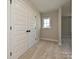 Cozy room featuring a carpeted floor, window, and a closet at 113 Tonbridge Way # Haf0031, Mooresville, NC 28115