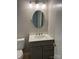 Updated bathroom featuring a modern vanity, elegant mirror, and clean design for a refreshing and functional space at 11421 Kingfisher Dr, Charlotte, NC 28226