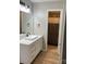 Modern bathroom featuring a stylish vanity, updated fixtures, and a separate shower for added convenience at 11421 Kingfisher Dr, Charlotte, NC 28226