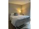 Cozy bedroom with soft lighting, comfortable furnishings, and a serene ambiance perfect for relaxation at 11421 Kingfisher Dr, Charlotte, NC 28226