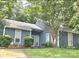Charming single-story home with a well-maintained lawn and mature trees for added curb appeal at 11421 Kingfisher Dr, Charlotte, NC 28226