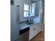 Well-appointed kitchen showcasing stainless steel appliances, granite countertops, and ample storage space at 11421 Kingfisher Dr, Charlotte, NC 28226