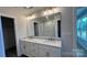 Bright bathroom featuring double vanity with white marble countertop and walk-in shower at 119 Tonbridge Way # Haf0033, Mooresville, NC 28115