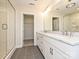 Bathroom featuring double sink vanity with marble countertop and tiled glass shower at 119 Tonbridge Way # Haf0033, Mooresville, NC 28115