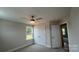 Comfortable bedroom with a ceiling fan and double door closet with window and neutral carpet at 119 Tonbridge Way # Haf0033, Mooresville, NC 28115