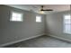 Comfortable bedroom with neutral carpeting and two windows providing ample natural light at 119 Tonbridge Way # Haf0033, Mooresville, NC 28115
