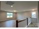 Bonus room with hardwood floors, recessed lighting, and scenic views from the windows at 119 Tonbridge Way # Haf0033, Mooresville, NC 28115