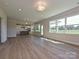 Bright living room featuring hardwood floors, recessed lighting, and a great view of the green backyard at 119 Tonbridge Way # Haf0033, Mooresville, NC 28115
