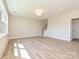Bright living room with hardwood floors and recessed lighting at 119 Tonbridge Way # Haf0033, Mooresville, NC 28115