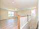 Upstairs living space with hardwood floors, ample windows, and lots of natural light at 119 Tonbridge Way # Haf0033, Mooresville, NC 28115
