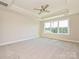 Large main bedroom featuring carpeted floors, a ceiling fan and a window letting in lots of natural light at 119 Tonbridge Way # Haf0033, Mooresville, NC 28115