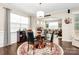 Elegant dining area featuring a round table and stylish chandelier at 12014 Belmont Mansion Dr, Charlotte, NC 28273