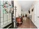 Inviting entryway features hardwood floors, fresh paint, and a decorative wreath, creating a warm and welcoming atmosphere at 12014 Belmont Mansion Dr, Charlotte, NC 28273