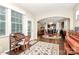 Cozy office space leading to an open-concept layout with dining area and bright kitchen at 12014 Belmont Mansion Dr, Charlotte, NC 28273